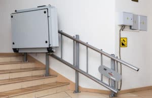 Access step lifts in building