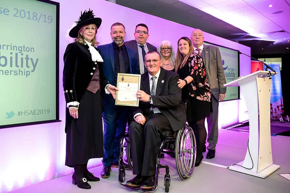 Warrington Disability Partnership team and Dave Thompson at award April 2019