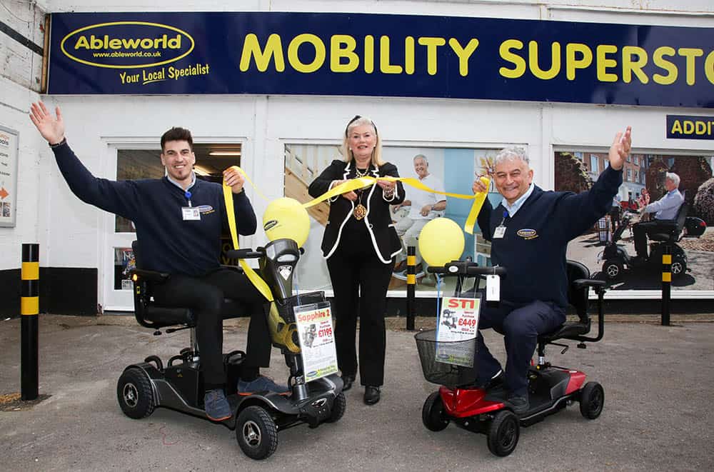 Mayor of Christchurch Town Cllr Lesley Dedman opens the new Ableworld branch in Christchurch with Branch Manager Eddie Raileanu and Franchise Director Chris Brown.