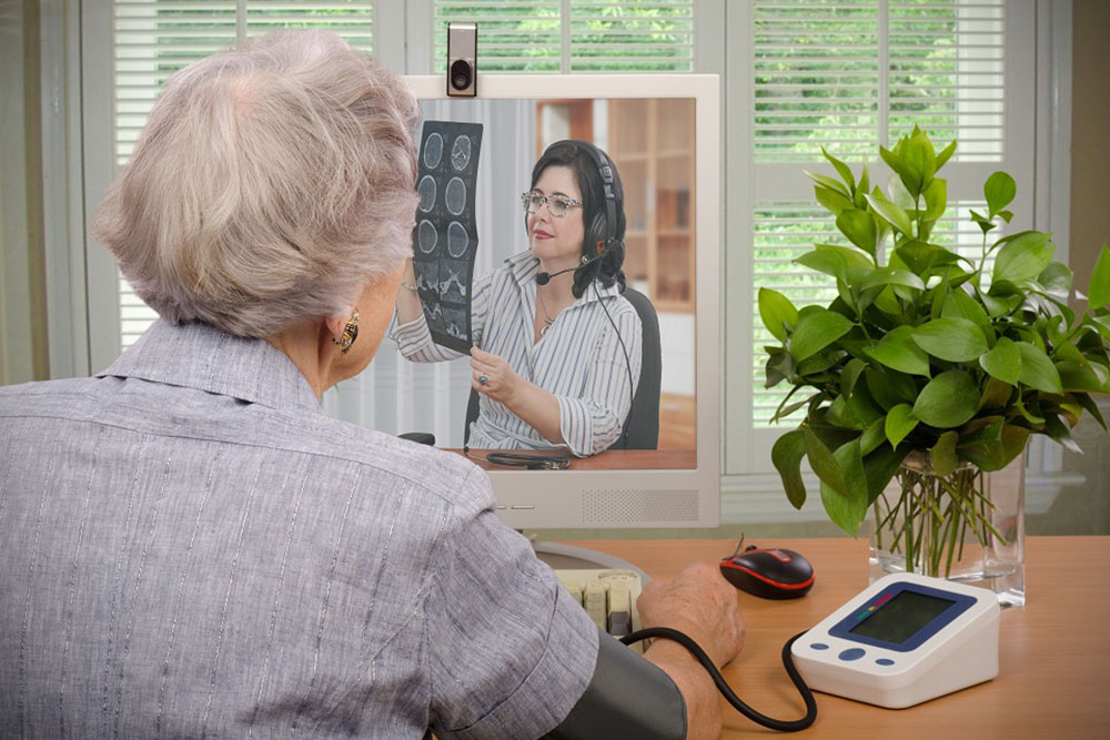 Ageing Society old woman using telecare innovation to champion growth