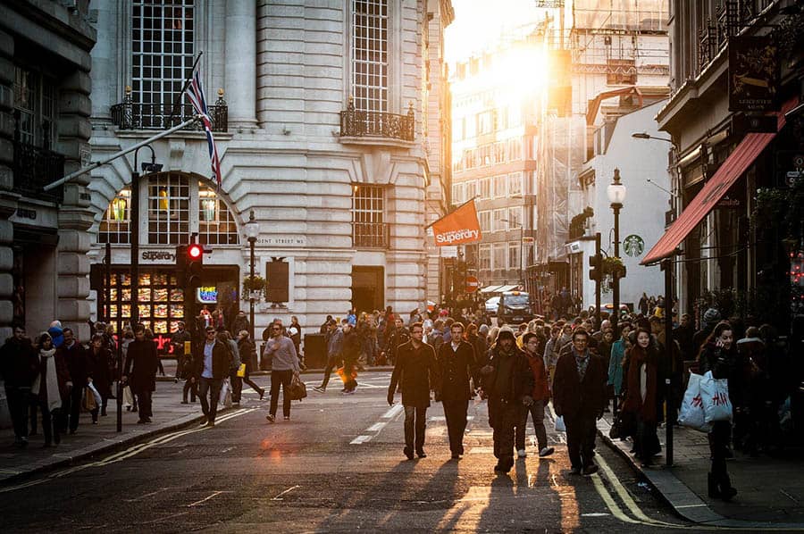 shoppers on busy street in the UK