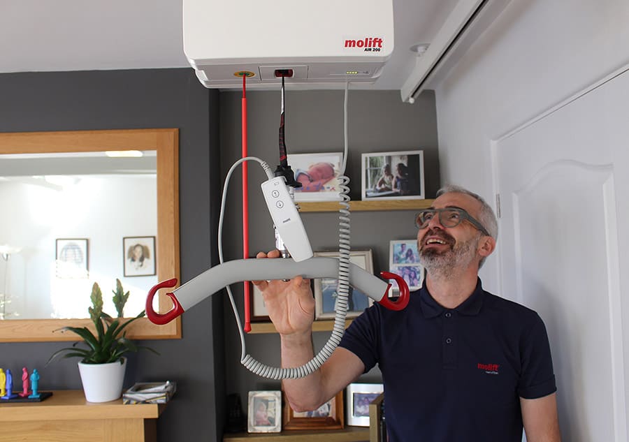 Colin Williams with Molift hoist image