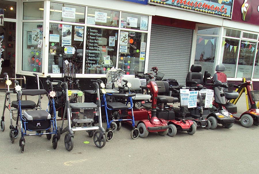 Walking frames mobility scooters outside store fleetwood