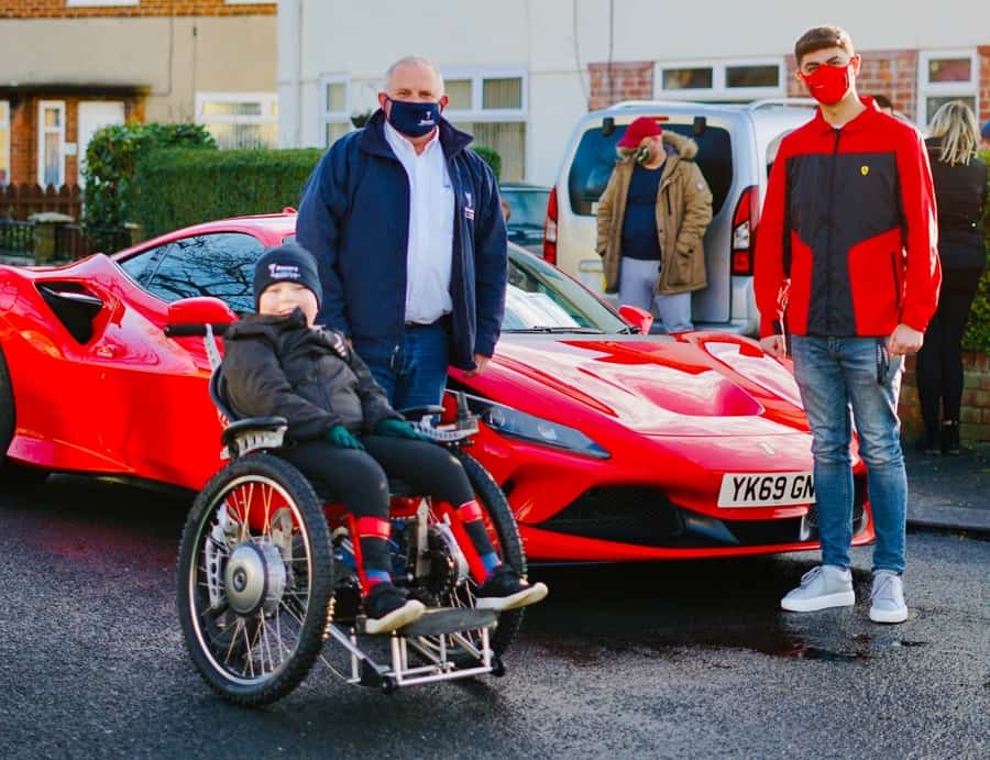 Recare gifts boy with F1-inspired powerchair