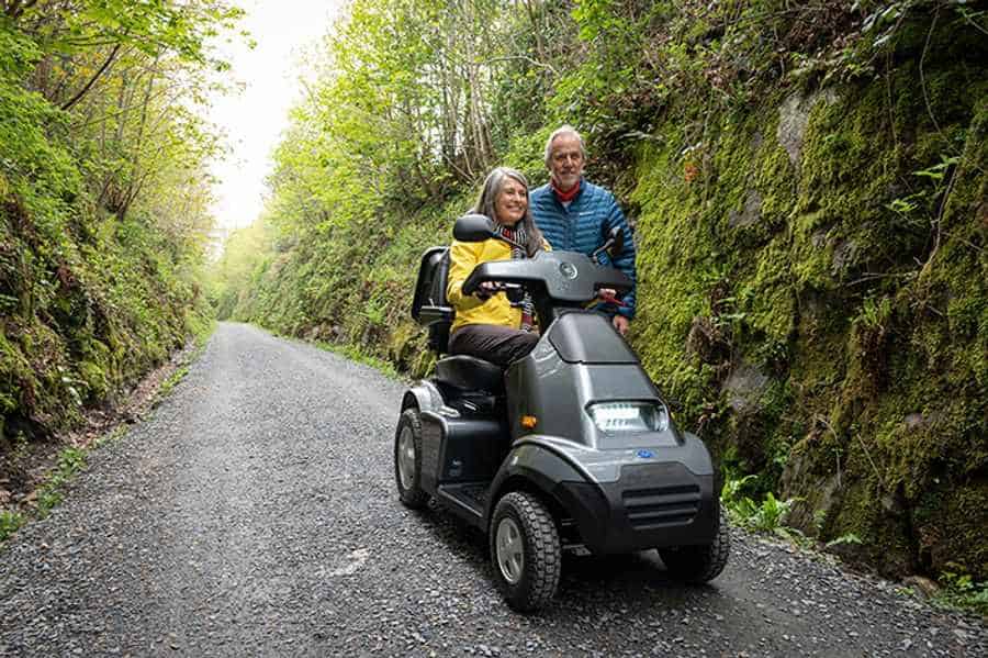 Visitors to the Lake District National Park enjoying the many accessible routes on a suitable TGA mobility scooter. 