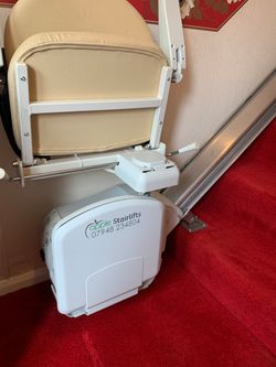 A newly installed Apple Stairlift