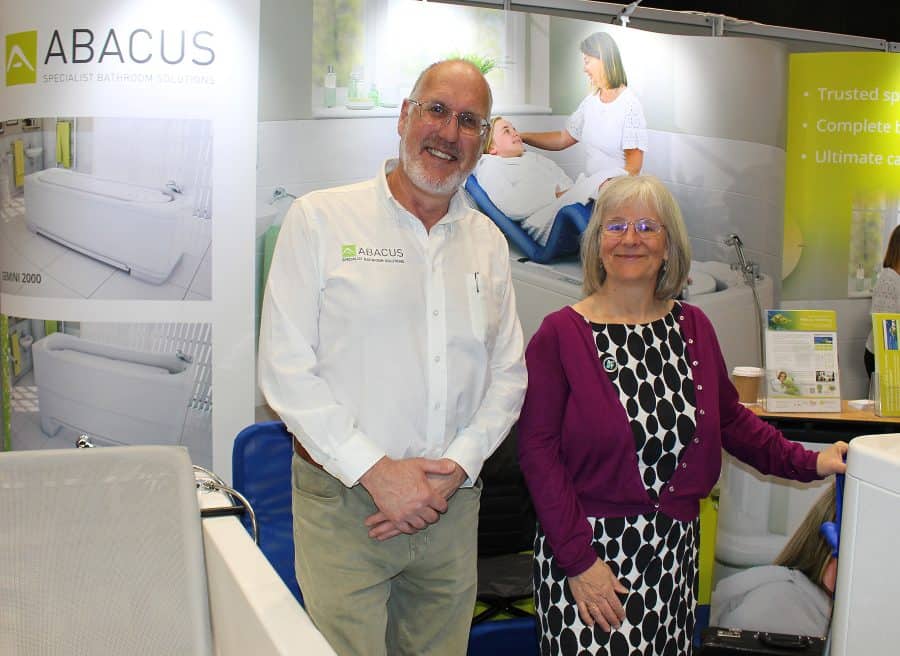 Abacus' Kate and David on stand at an exhibition.