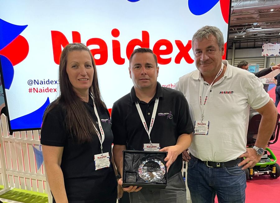 Precision Rehab accepts 'Best in Show' award at Naidex