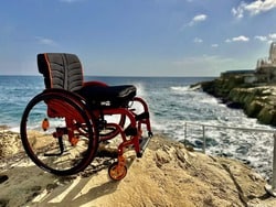 Quickie wheelchair on beach