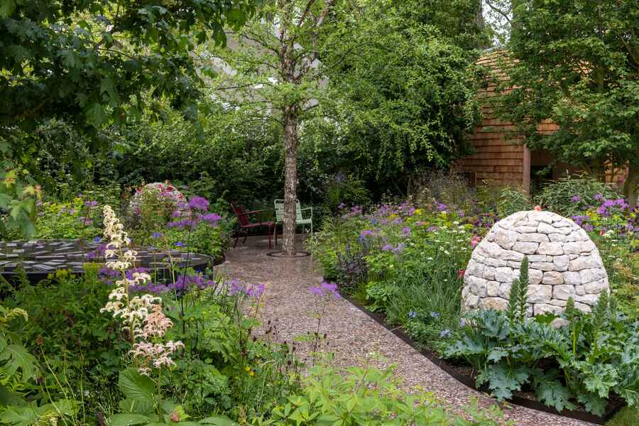 Horatios Garden. Designed by Charlotte Harris and Hugo Bugg. Sponsored by Horatio's Garden and Project Giving Back. Show Garden. RHS Chelsea Flower Show 2023. Stand no 321.